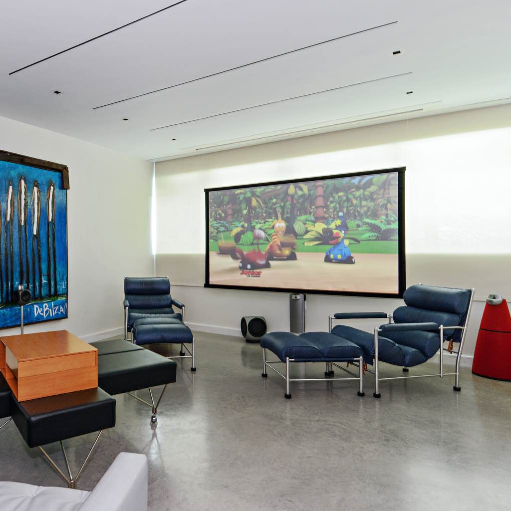 Bang & Olufsen BeoLab 9 in red with cables hidden under the floor, in South Beach, FL. By dmg Martinez Group.